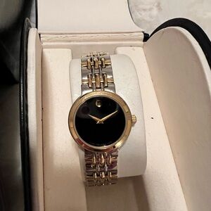 Movado two toned silver and gold watch. Worn only a few times. Needs a battery.
